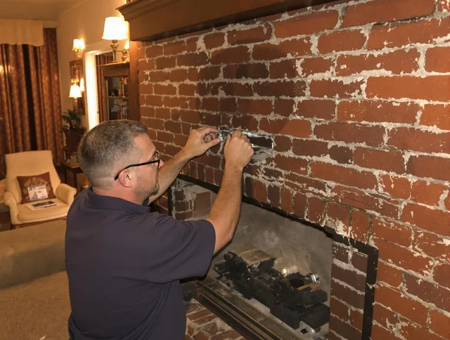 La Verne Chimney Sweep expert fixing a fireplace in La Verne, CA